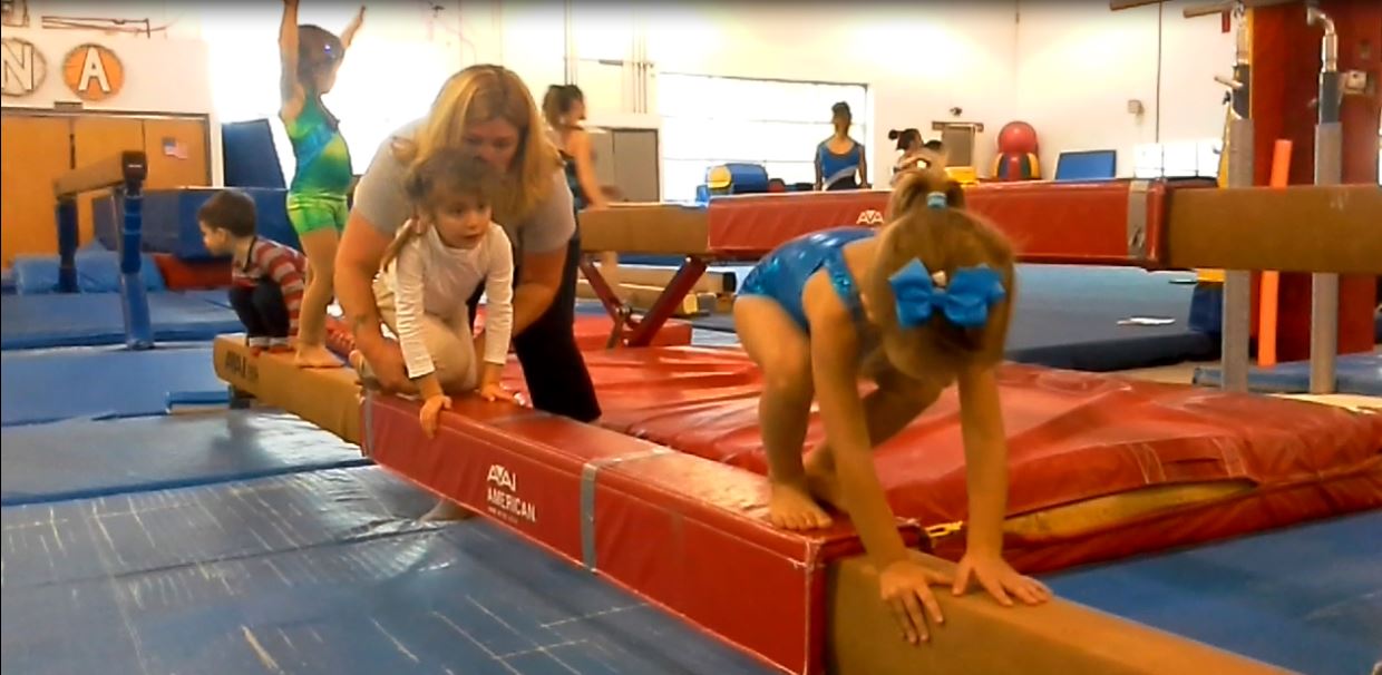 Young children practicing balance at ENA Gymnastics